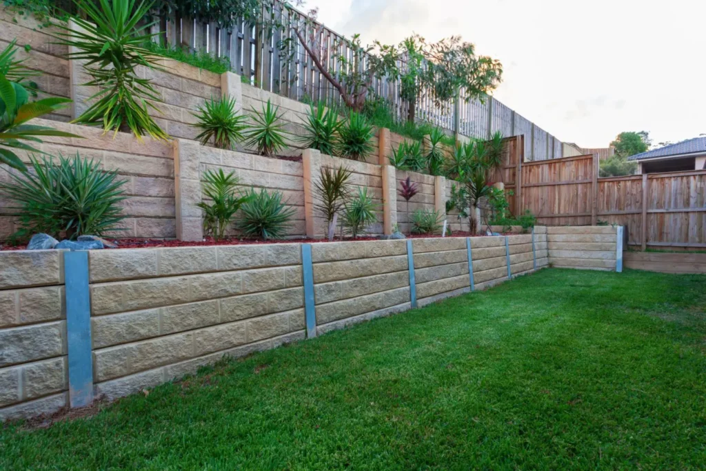 How Retaining Wall Contractors Design Walls for Strength and Drainage